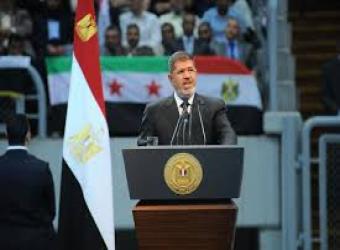 مرسي أكرم السوريين